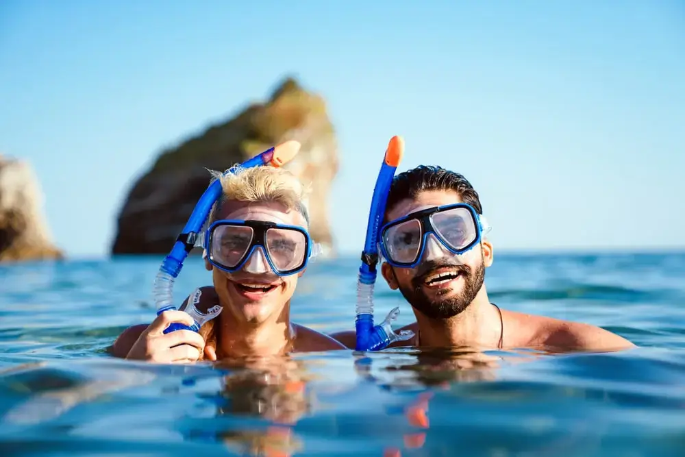 white couple getting snorkelling experience in montegobay ,jamaica