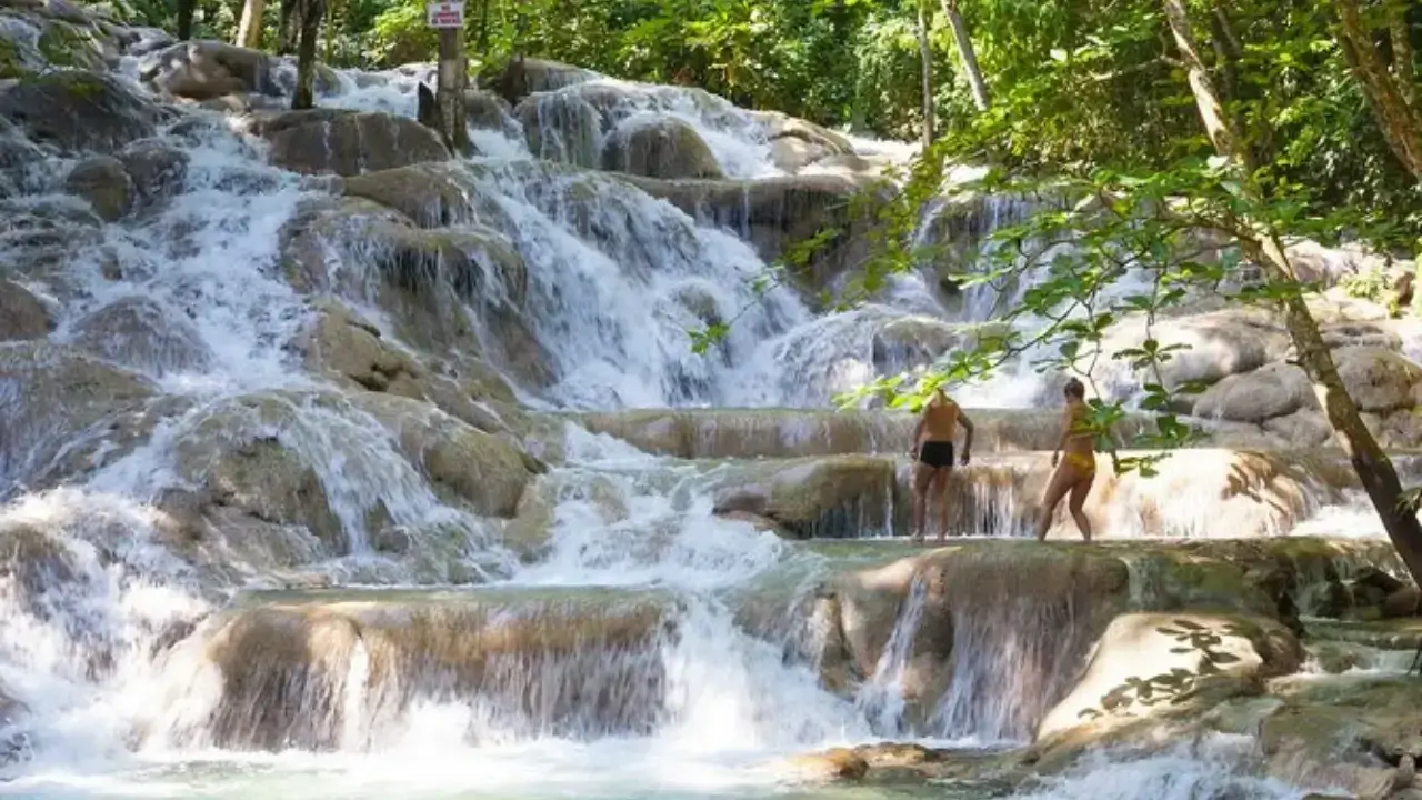 White couple at dunn's river falls in jamaica